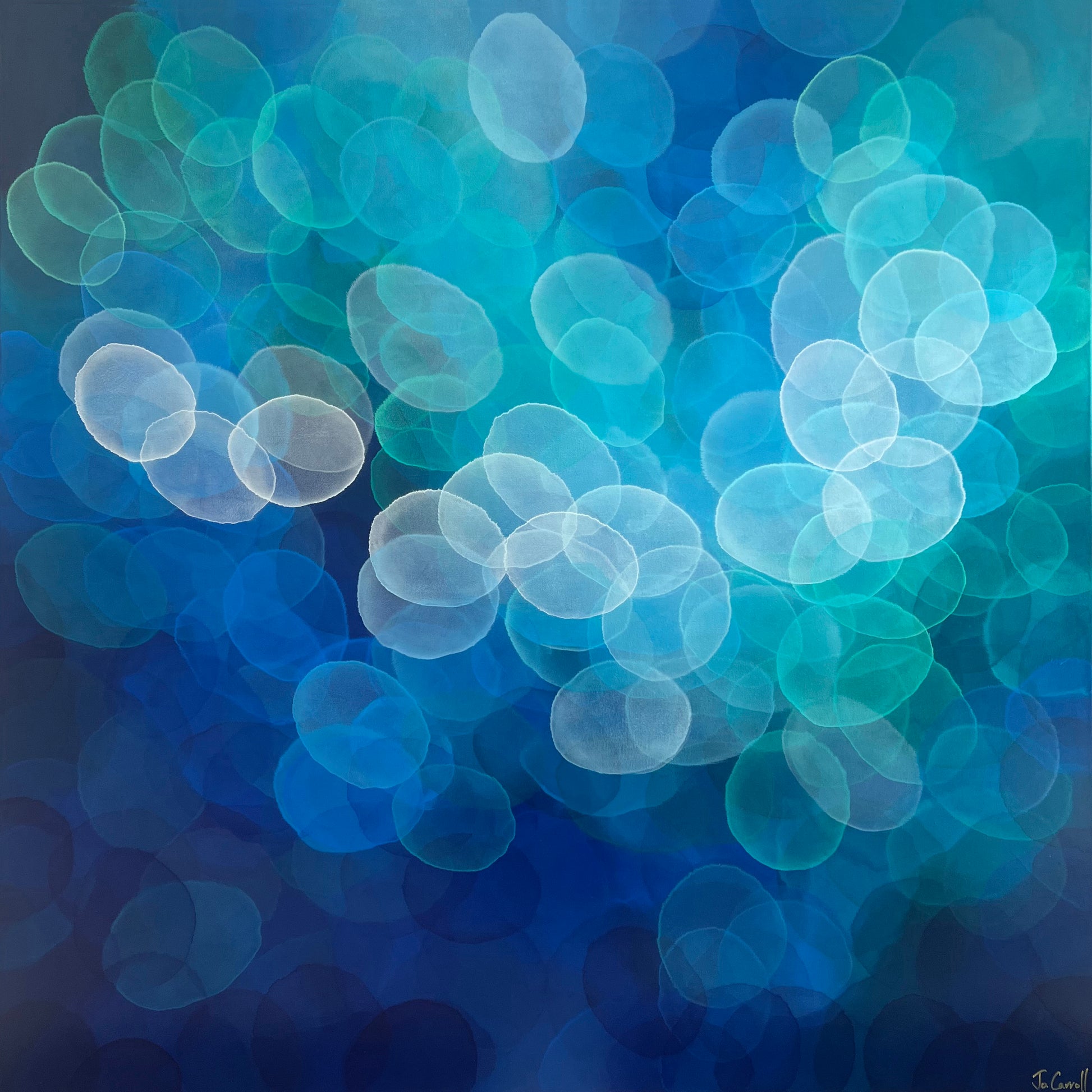 Abstract blue and green blurred circles on a dark background